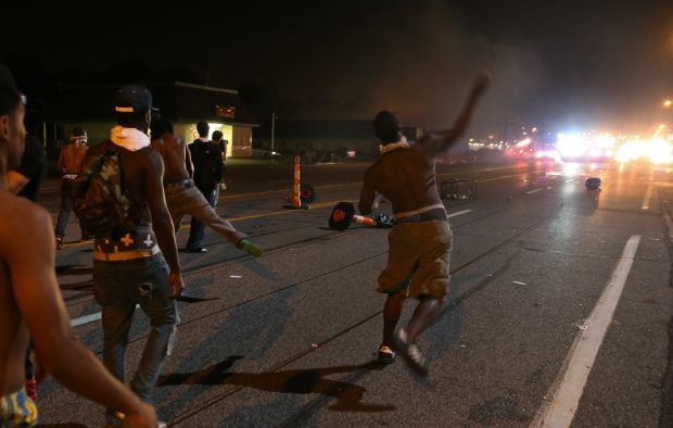 Police tear gas protesters again